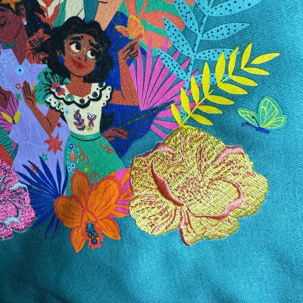 Disney Parks Encanto Kitchen Tea Towel Mirabel Luisa Isabela Tassels Floral NEW